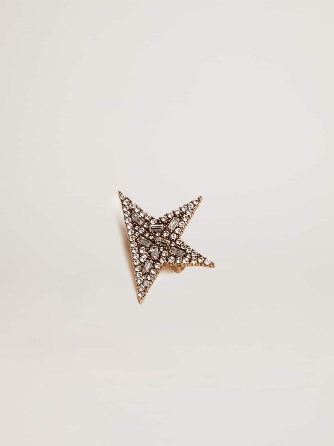 Women’s antique gold-colored brooch with decorative crystals