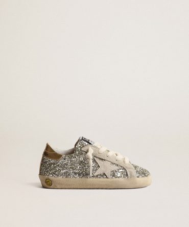 Super-Star Junior in glitter with a suede star and gold heel tab