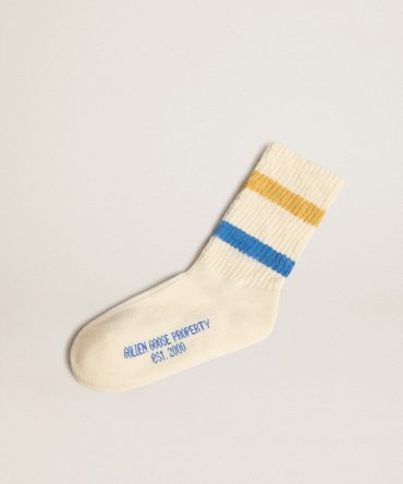 Worn white Kids socks with distressed details and two-tone bright blue and mustard stripes