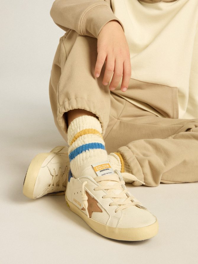 Worn white Kids socks with distressed details and two-tone bright blue and mustard stripes - Image 2