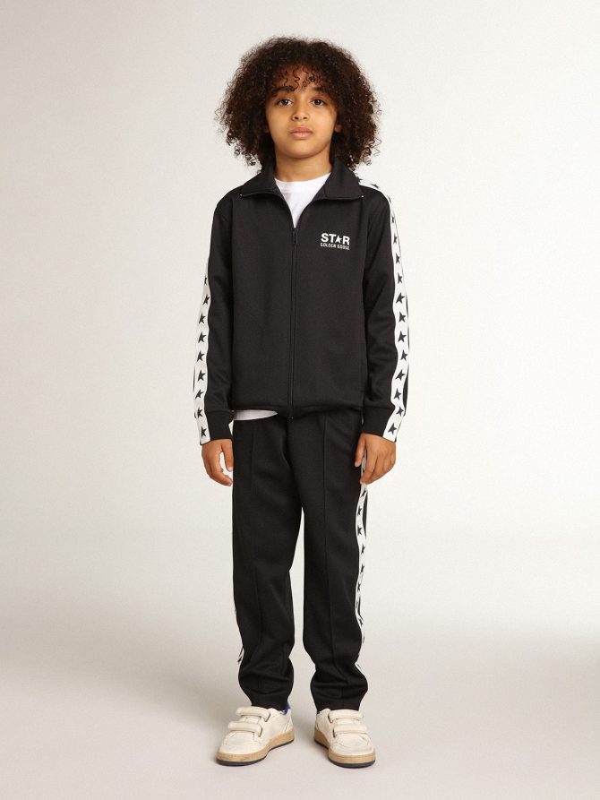Dark blue joggers with white strip and contrasting stars - Image 4
