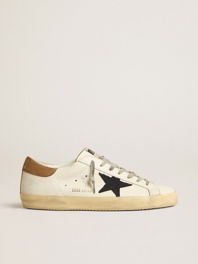 Men’s Super-Star in white leather with midnight-blue canvas star and tobacco leather heel tab