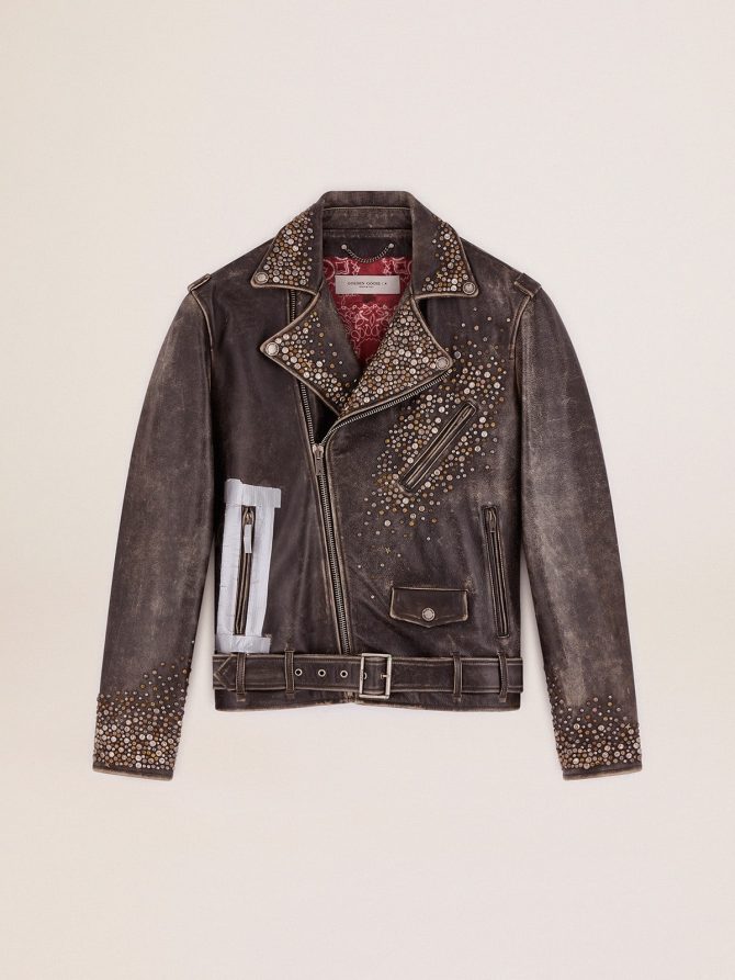 Men’s leather biker jacket with hammered studs and adhesive tape