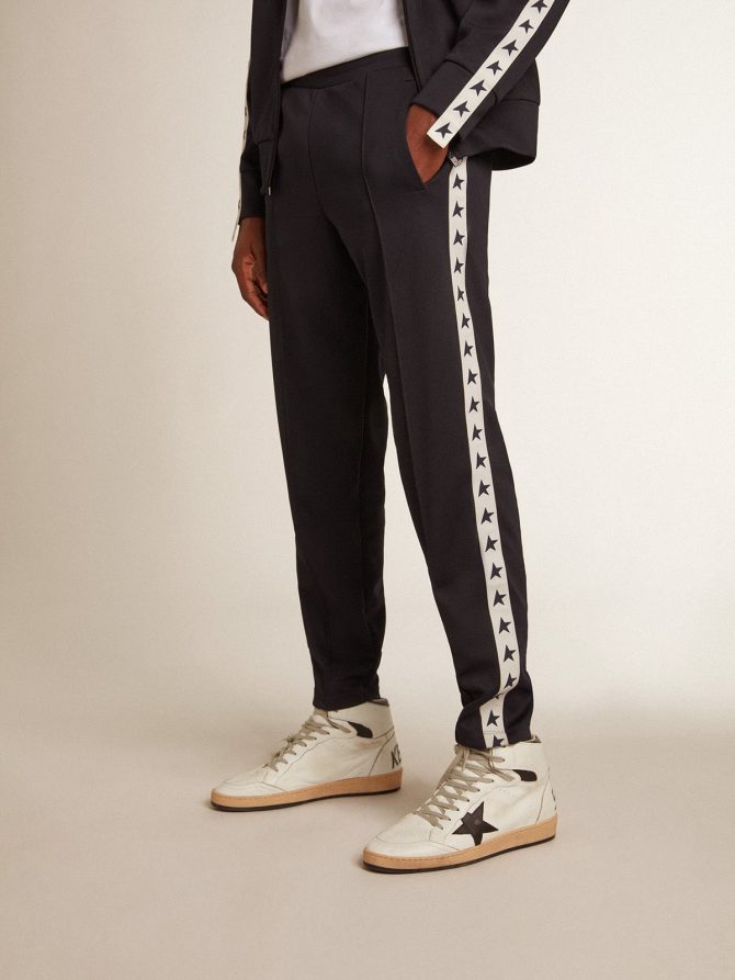 Dark blue joggers with contrasting strip and stars - Image 2