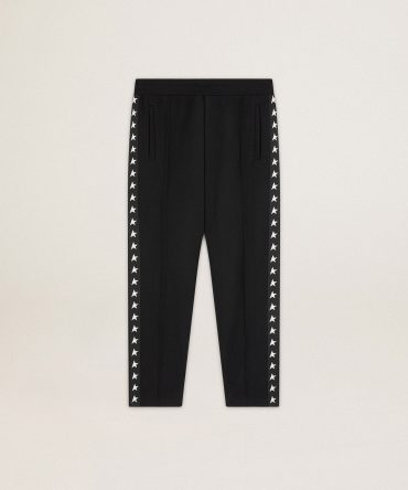 Men’s black joggers with white stars on the sides