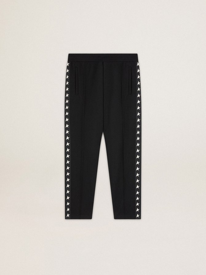 Men’s black joggers with white stars on the sides