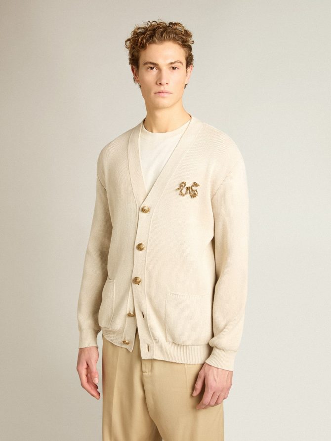 Cardigan in aged white cotton with gold button fastening - Image 2