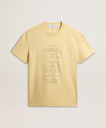 Men’s cotton T-shirt in pale yellow with faded lettering