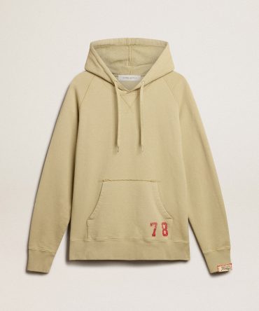 Pale eucalyptus-colored hoodie with front pocket