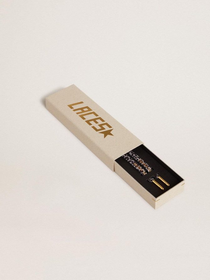 Gray and black animal-print laces with contrasting gold logo - Image 2