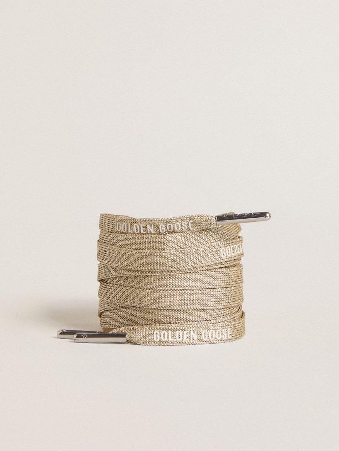 Gold-colored Lurex laces with contrasting white logo