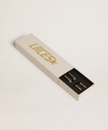 Dark green cotton laces with contrasting gold-colored logo