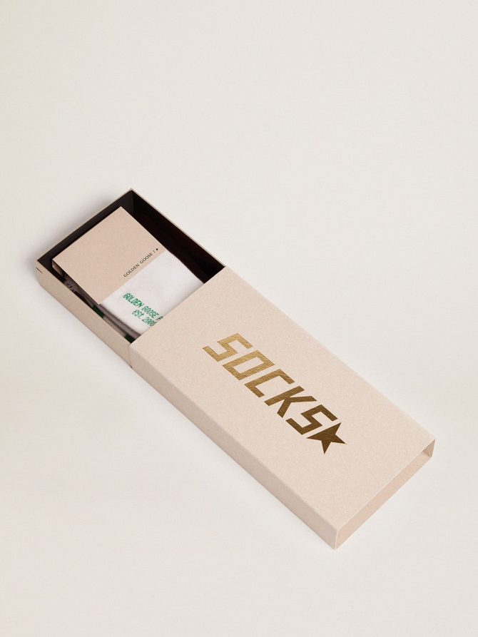 Cotton socks with distressed finishes, green stripes and logo - Image 2