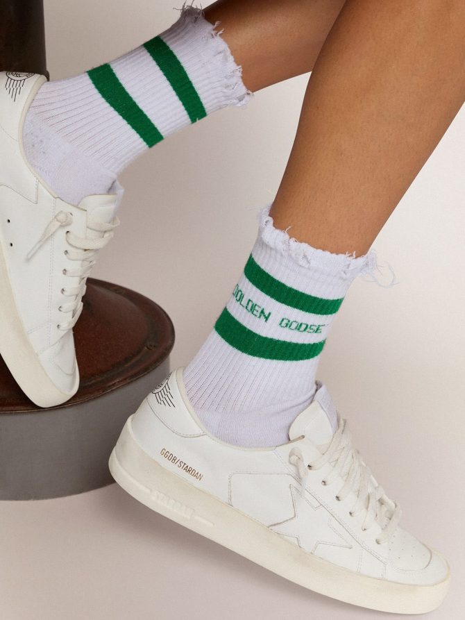 Cotton socks with distressed finishes, green stripes and logo - Image 3