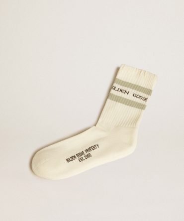 Worn-white socks with distressed details and sage-green stripes