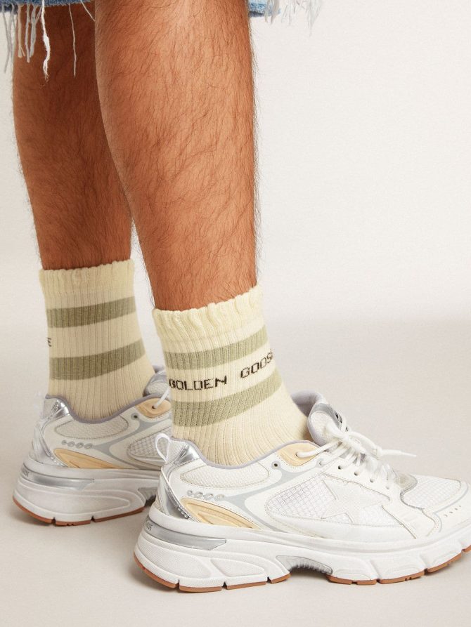 Worn-white socks with distressed details and sage-green stripes - Image 2