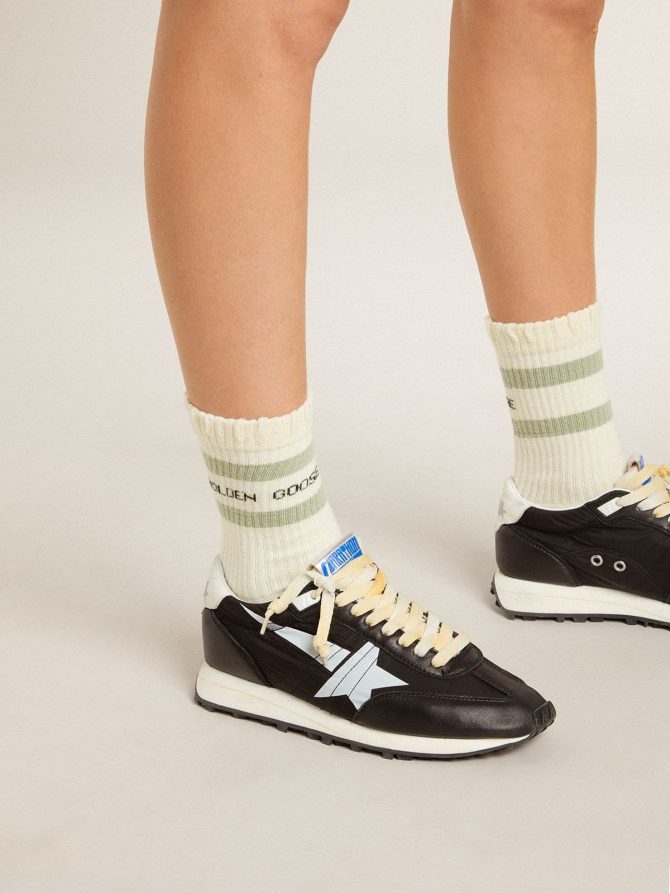 Worn-white socks with distressed details and sage-green stripes - Image 4