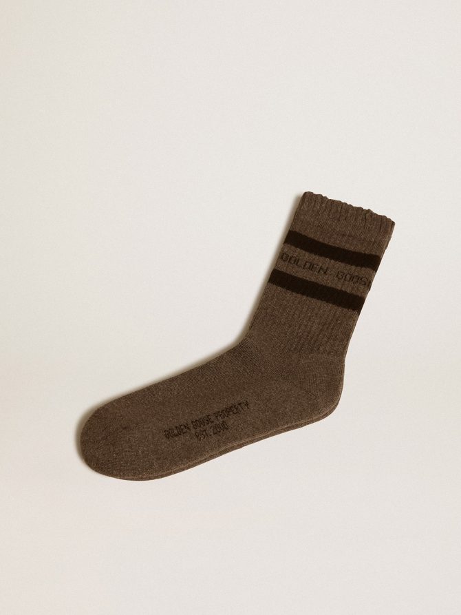 Grey socks with distressed details and dark brown stripes