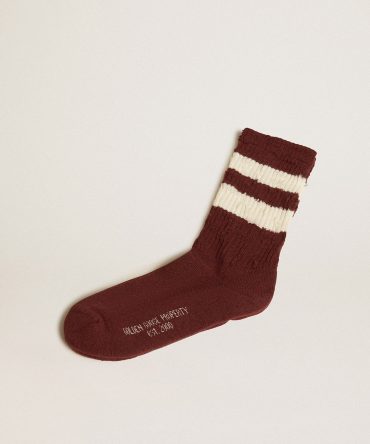 Brown socks with distressed details and worn-white stripes
