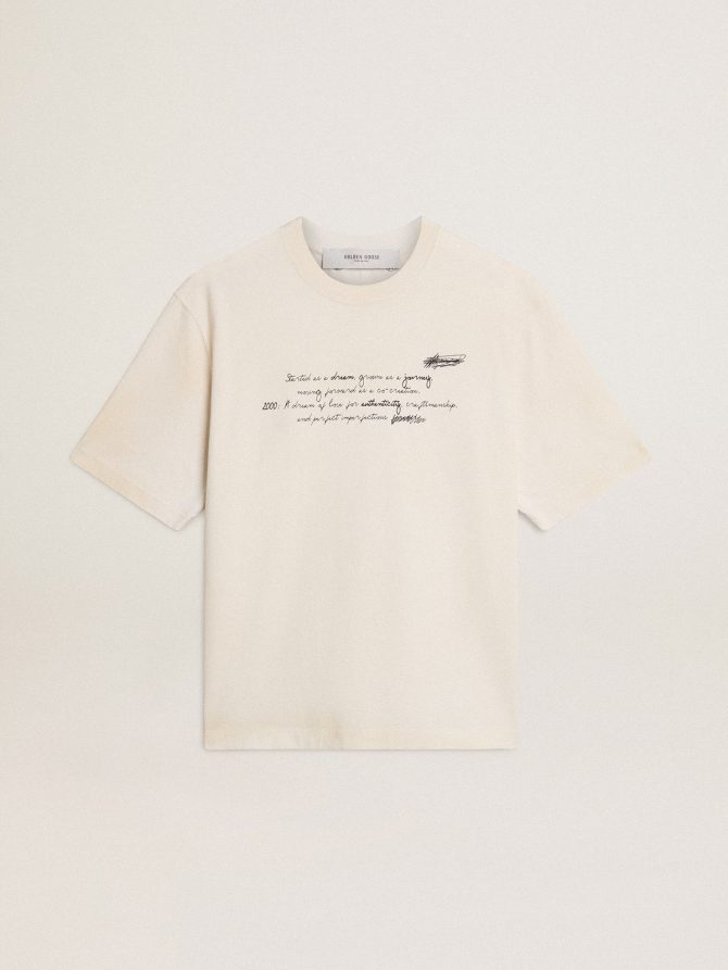Worn-white unisex T-shirt with printed lettering