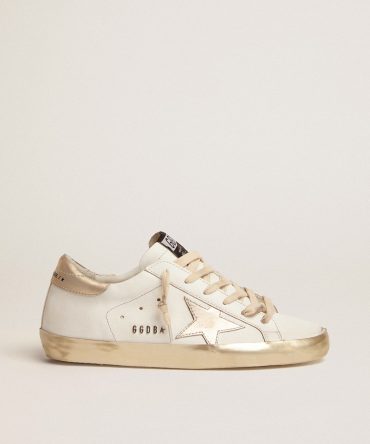 Women’s Super-Star with gold sparkle foxing and metal stud lettering