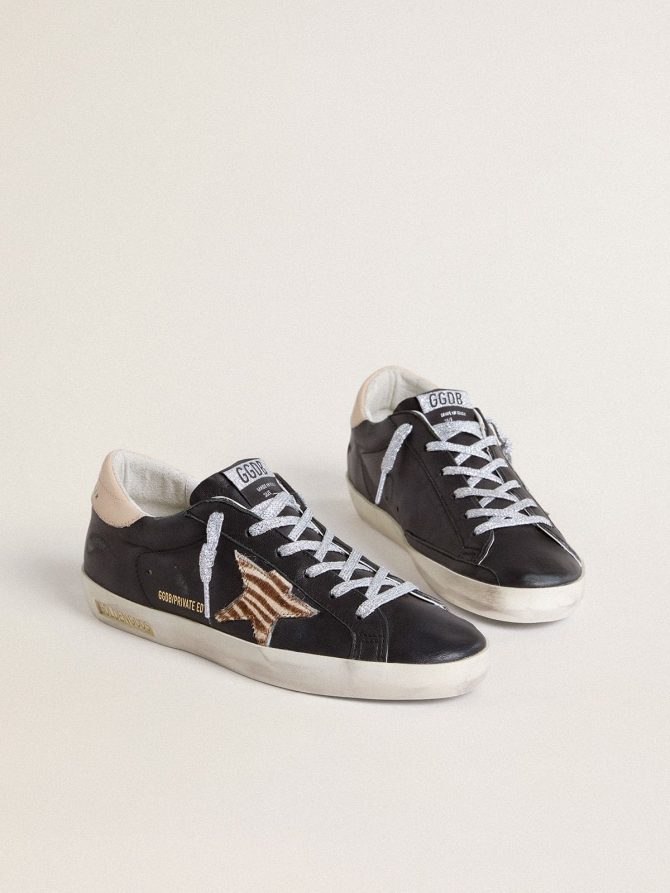 Women’s Super-Star in black nappa leather with zebra-print pony skin star and beige leather heel tab - Image 2