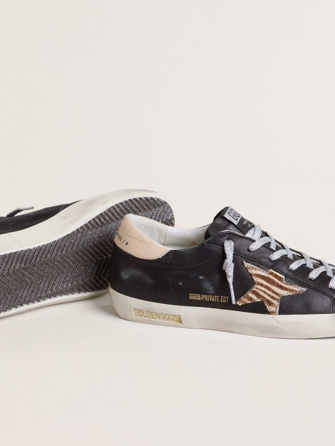 Women’s Super-Star in black nappa leather with zebra-print pony skin star and beige leather heel tab - Image 3