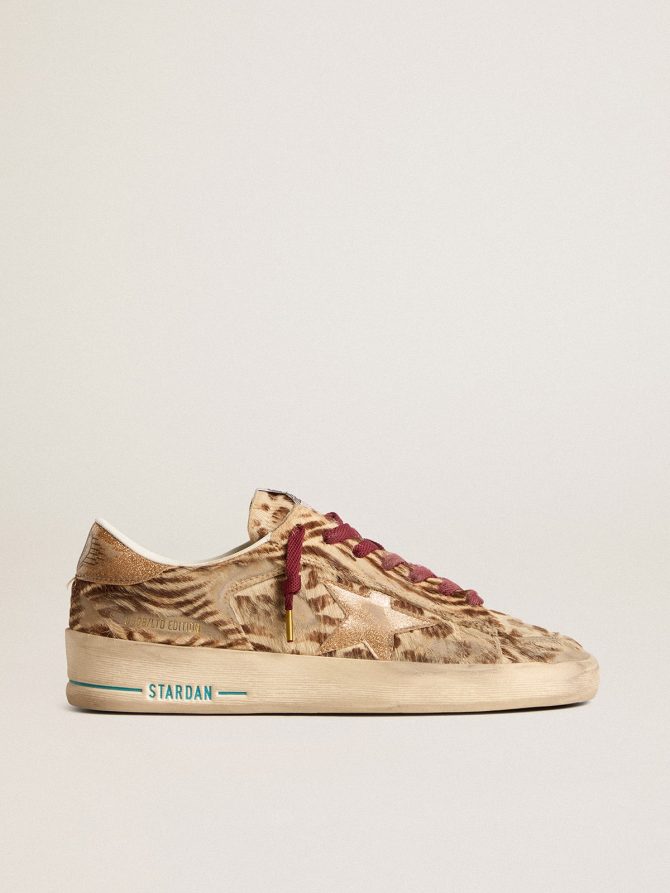 Women’s Stardan LTD in animal-print pony skin with gold glitter star