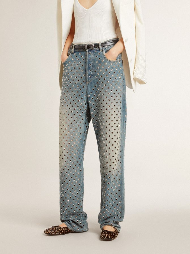 Women’s washed jeans with all-over eyelets