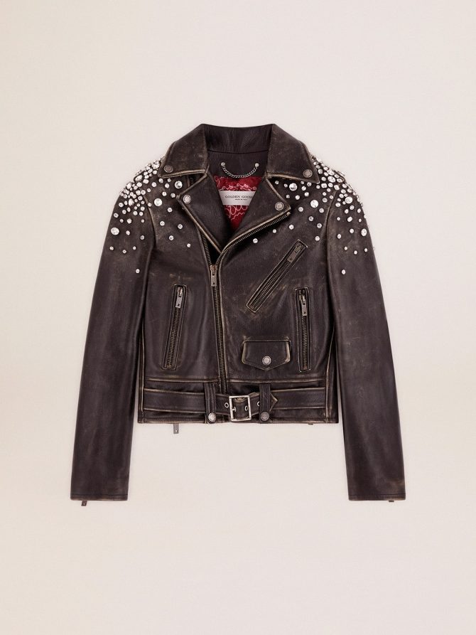 Women’s biker jacket in distressed leather with cabochon crystals