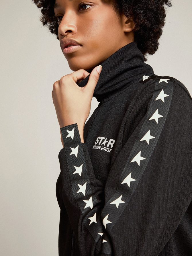 Women’s black zipped sweatshirt with white stars - Image 2