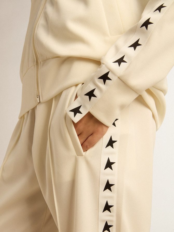 Women’s white zipped sweatshirt with white strip and black stars - Image 5