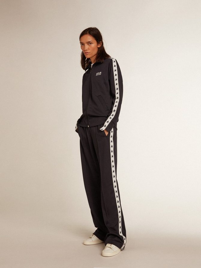 Dark blue joggers with white strip and contrasting stars - Image 3