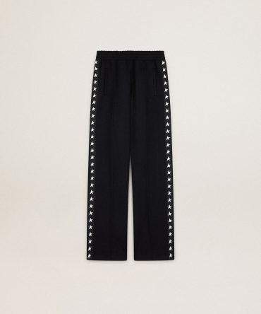 Women’s black joggers with white stars on the sides