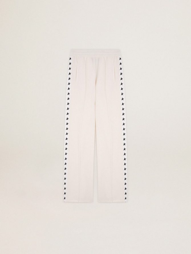 Women’s white joggers with stars on the sides