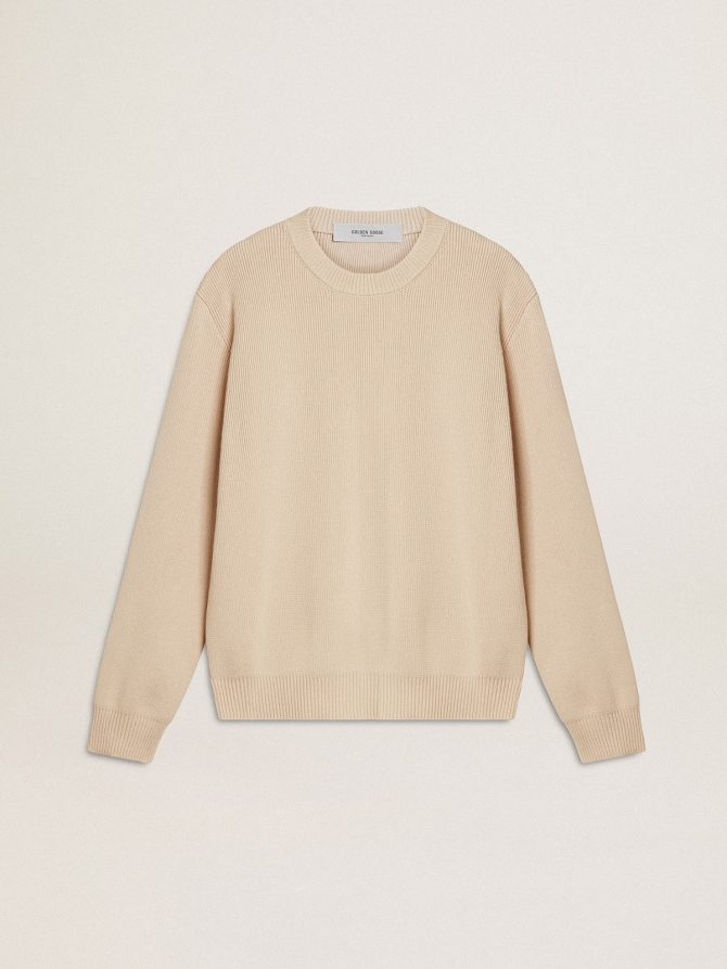 Women’s beige sweater with ‘Golden’ lettering on the back