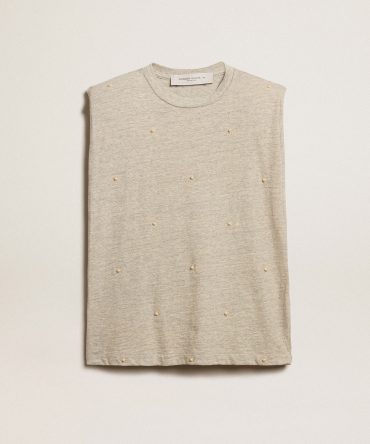 Aged white sleeveless T-shirt with padded shoulder and pearls