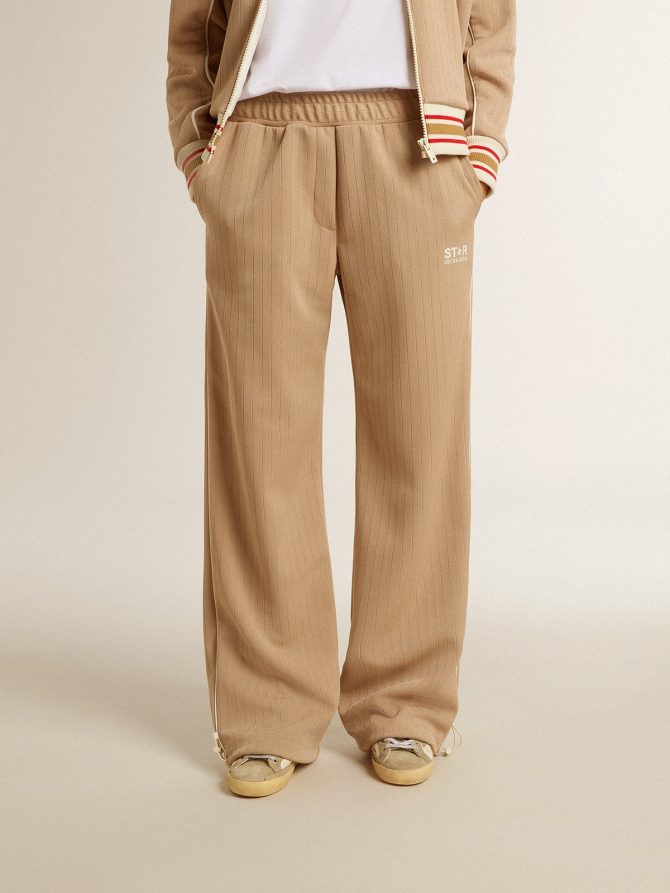Women’s light beige joggers with white logo - Image 2